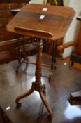 A 19th century rosewood adjustable tripod music or reading stand.
