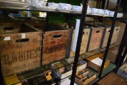 Six R Whites bottle storage crates.