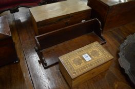 An inlaid box, rosewood book trough and a rosewood tea caddy.
