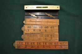 Carpenters rules and a level.