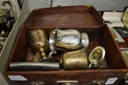 A small leather case containing plated goblets etc.