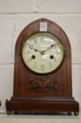 An Edwardian inlaid mahogany lancet shaped mantel clock, the enamel dial signed Walter Wyatt,