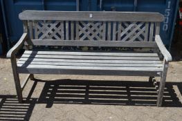 A hardwood garden bench.