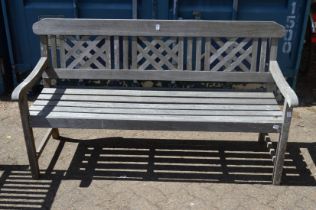 A hardwood garden bench.