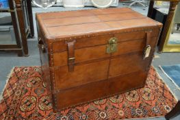 A good large modern leather storage trunk.