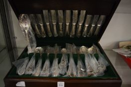 A cased canteen of bead pattern cutlery.