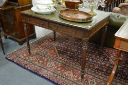 A 19th century mahogany library or writing table with green leather inset top, two frieze drawers on