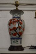 A large Chinese baluster shaped vase lamp.