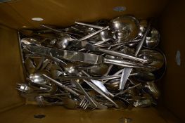 A large quantity of modern stainless steel cutlery.