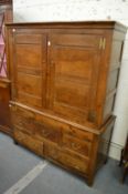 An 18th century oak press cupboard.