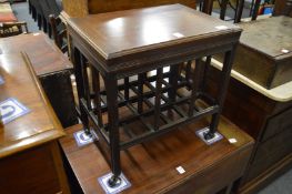 An unusual combination magazine rack/storage box with hinged lid.