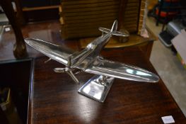 An aluminium model of a spitfire.