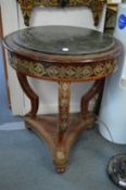 A French style mahogany and ormolu mounted circular marble top gueridon.
