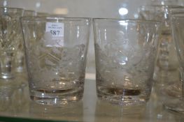 A pair of tumblers engraved with a name and crest William Kingdon.
