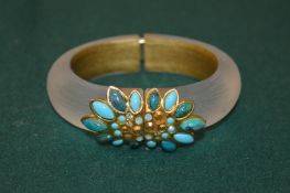 An Alexis Bittar bracelet.