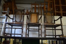 A pair of barley twist decorated armchairs and a similar chair.
