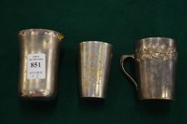 Three small plated cups.