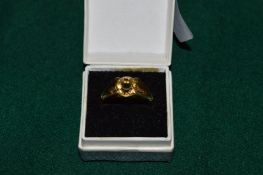 A 9ct gold and citrine ring.