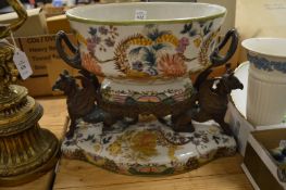 A decorative porcelain and metal mounted centre piece.