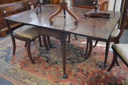 George III mahogany rectangular gateleg dining table.