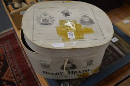 A black silk top hat size 6 5/8 (18.5cm x 14.5cm), boxed.