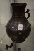 A pair of Chinese champleve enamel bronze twin handled vases, one vase af.