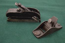 Two small wood working planes.
