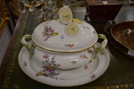 A Meissen porcelain tureen cover and stand, the cover with a lemon form finial, the body decorated