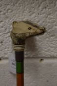 A badger head walking stick.