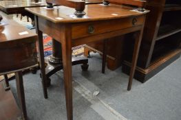 A mahogany single drawer side table.