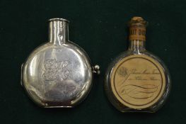A silver mounted perfume bottle.