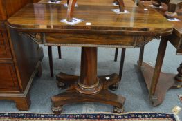 A 19th century rosewood D shaped fold-over card table.