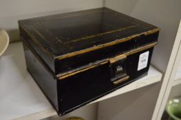 A black Japanned spice tin containing five named compartments.