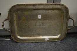 A plated twin handled tray with engraved decoration.
