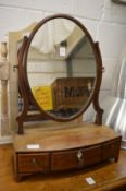 Two dressing table mirrors.