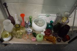 A good collection of coloured and other glassware to include vases and bowls etc.