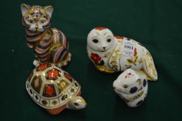 A Crown Derby model of a seal and three other items.