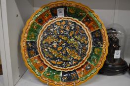 A Chinese sancai glazed dish decorated with birds.