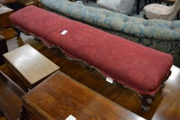 A Victorian carved rosewood fender footstool.