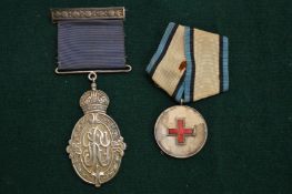 A George XI India public service medal and an Estonia Order of the Red Cross silver medal.