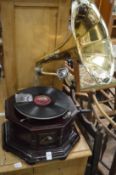 A reproduction HMV gramophone.