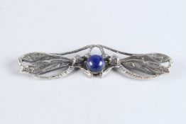 A SILVER AND LAPIS DRAGONFLY BROOCH.