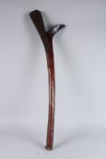 A CARVED FIJIAN CLUB. 34ins long.