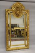 A GOOD LOUIS XVITH STYLE GILTWOOD UPRIGHT PORTRAIT MIRROR. 7ft high x 3ft 4ins wide.