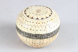 AN INDIAN BONE INLAID CIRCULAR BOX. 3ins diameter.