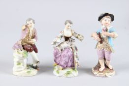 THREE SMALL 19TH CENTURY MEISSEN FIGURES, a young boy with a posy, a girl with a dog and a man