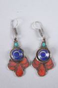 A PAIR OF TIBETAN TURQUOISE, SILVER AND CORAL EARRINGS.