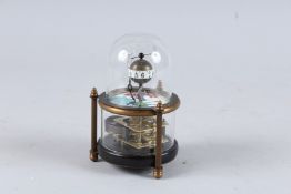 A SMALL FISH CLOCK in a dome. 6ins high.