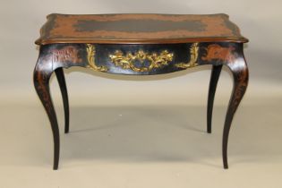 A 19TH CENTURY EBONY, MARQUETRY AND ORMOLU TABLE of serpentine outline, with a single frieze drawer,