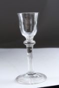 A GEORGIAN CORDIAL GLASS with plain bowl. 6ins high.